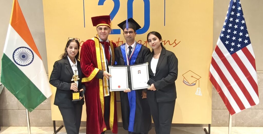 Vinit Kumar with university officials and team at Washington Digital University graduation ceremony USA 2025 holding honorary doctorate certificate